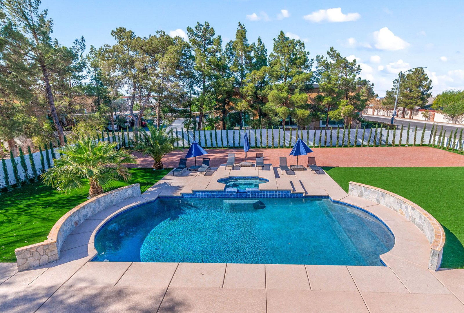 Outdoor Tropical Pool Area At Addiction Treatment Center.
