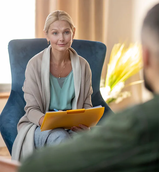 Person In Therapy Session At An Alcohol Detox Center